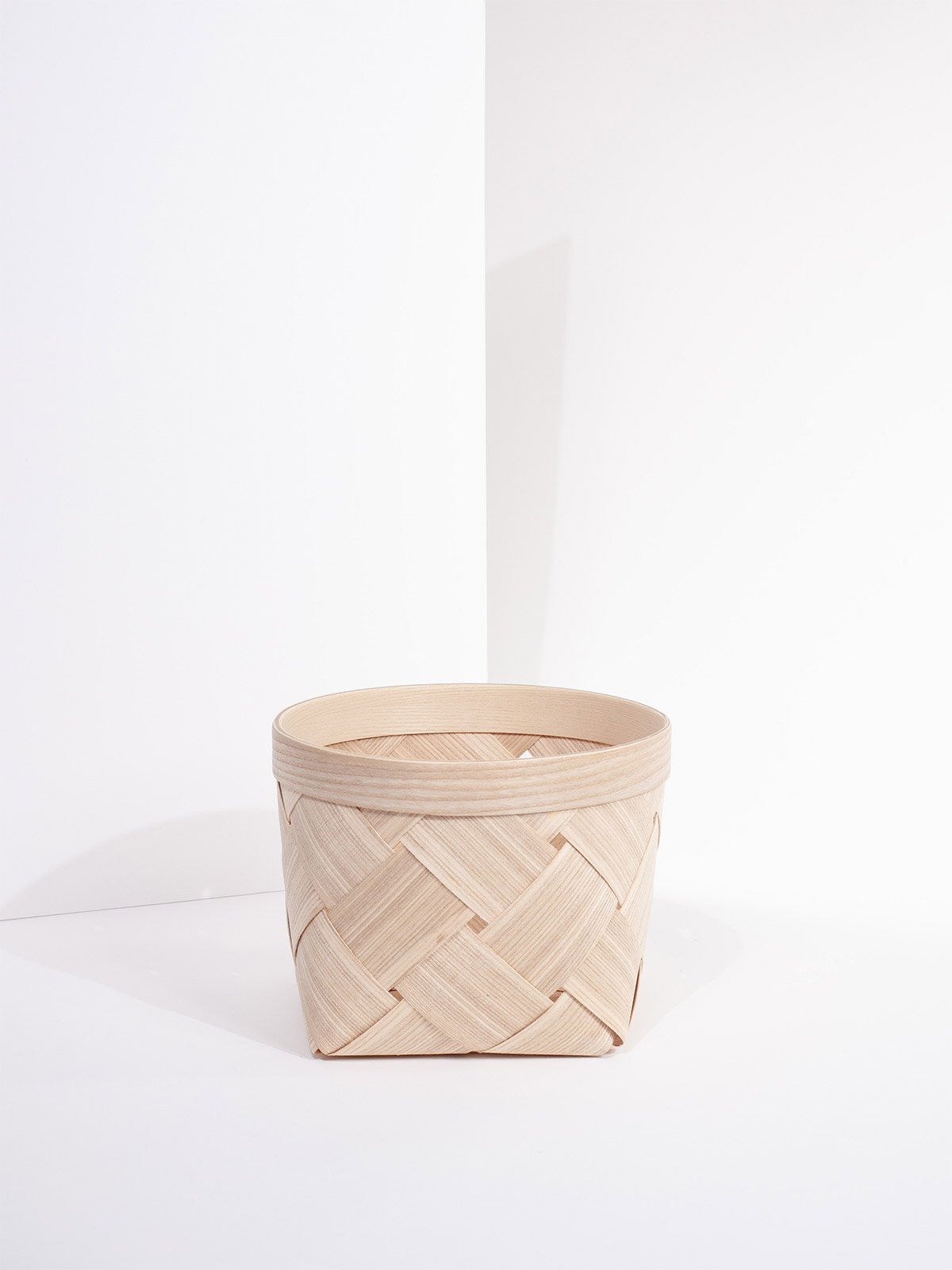 Small natural wooden basket with handles